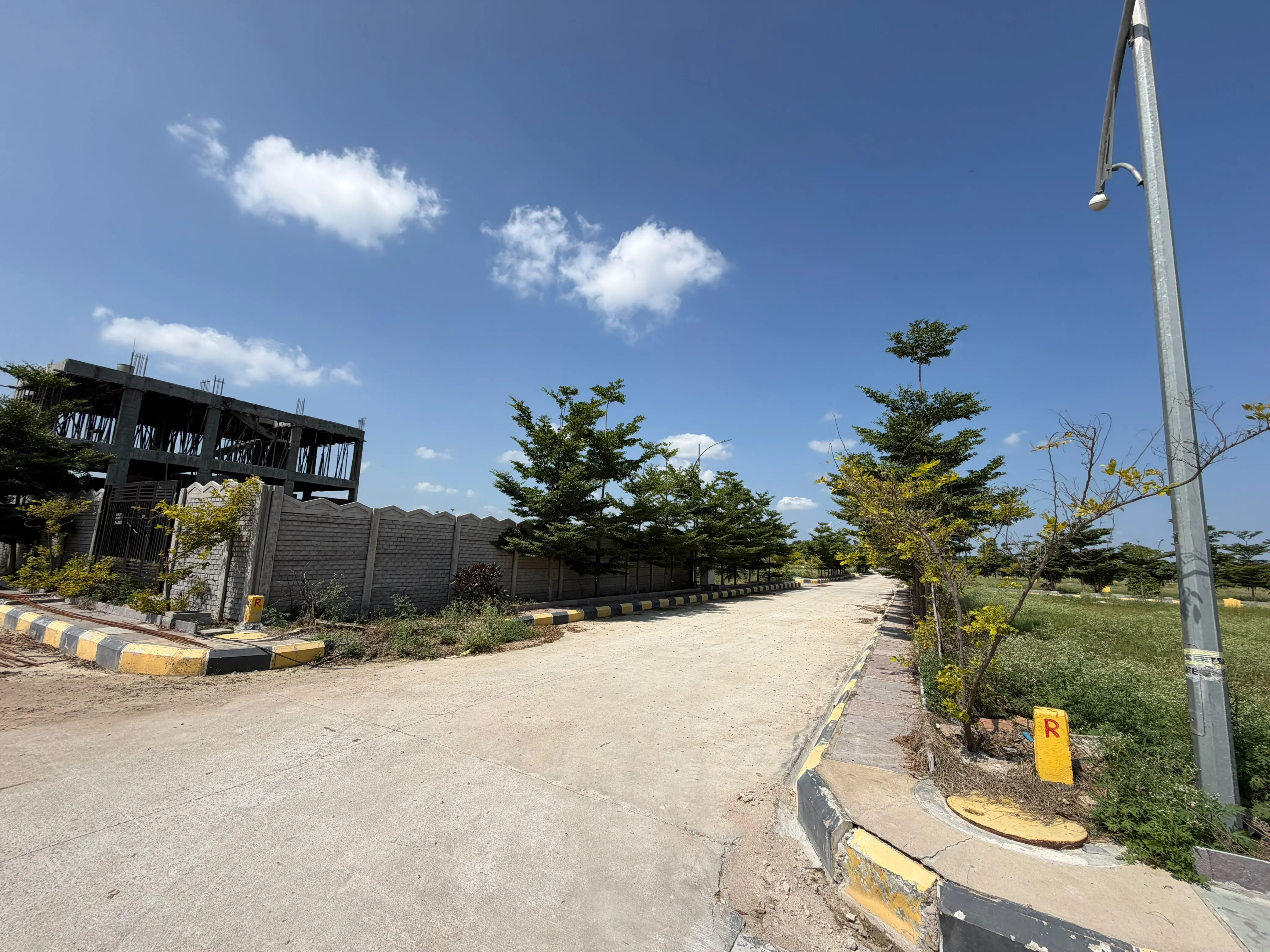 Vasudaika Henleywoods Gated HMDA approved villa plots at Hyderabad near Shamshabad airport 9701498367